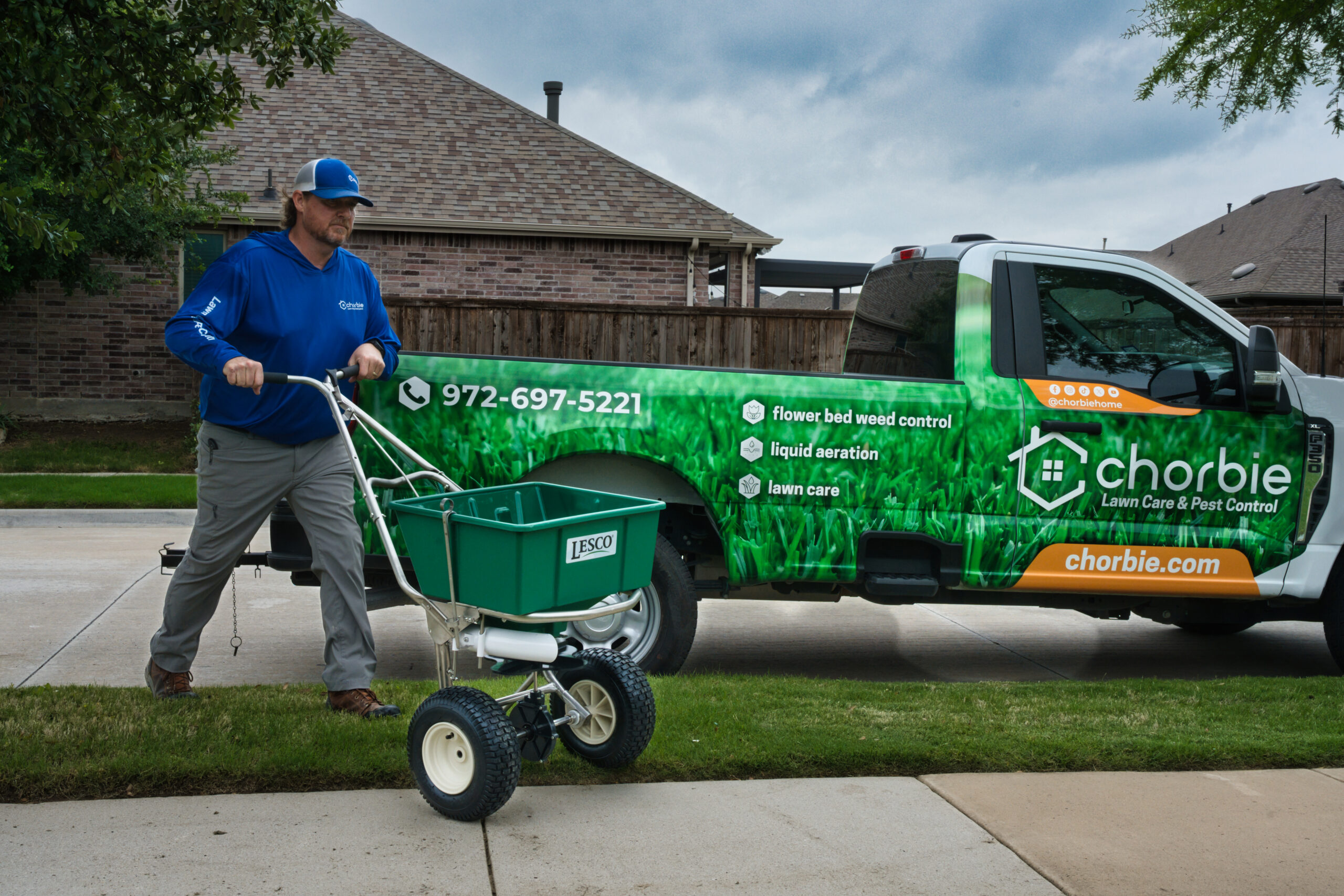 Chorbie lawn care technician helping with brown patch treatment in North Texas